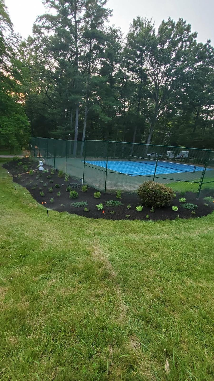 Fresh mulch installed around residential landscaping